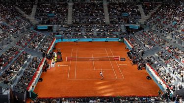 Norway's Casper Ruud serves to Britain's Jack Draper during their 2025 ATP Tour Madrid Open tennis tournament singles final match at the Caja Magica in Madrid, on May 4, 2025. 
OSCAR DEL POZO / AFP