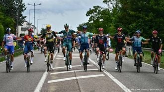 (From L) Red Bull - BORA - hansgrohe team's Italian rider Gianni Moscon, Lidl - Trek team's Italian rider Simone Consonni, Team Visma - Lease a bike team's Italian rider Edoardo Affini, Lidl - Trek team's Italian rider Jonathan Milan wearing the best sprinter's green jersey, XDS Astana Team's Italian rider Davide Ballerini, Tudor Pro Cycling Team's Italian rider Alberto Dainese, Tudor Pro Cycling Team's Italian rider Matteo Trentin, XDS Astana Team's Italian rider Simone Velasco and EF Education - EasyPost team's Italian rider Vincenzo Albanese cycle at the start of the 21st and final stage of the 112th edition of the Tour de France cycling race, 132.3 km between Mantes-la-Ville and Paris Champs-Elysees Avenue, on July 27, 2025. 
Marco BERTORELLO / AFP