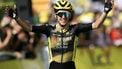 Team Visma - Lease a bike team's British rider Simon Yates cycles to the finish line to win the 10th stage of the 112th edition of the Tour de France cycling race, 165.3 km between Ennezat and Le Mont-Dore Puy de Sancy, in central France, on July 14, 2025. 
Loic VENANCE / AFP