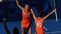 Netherlands' midfielder #02 Luna Noa Fokke celebrates with teammates after scoring their third goal in the women's quarter-final field hockey match between Netherlands and Britain during the Paris 2024 Olympic Games at the Yves-du-Manoir Stadium in Colombes on August 5, 2024. 
Ahmad GHARABLI / AFP