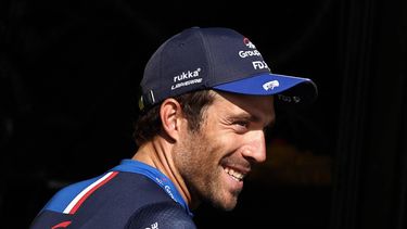 2023-07-22 17:42:06 Groupama - FDJ's French rider Thibaut Pinot celebrates on the podium with the most combative rider's award after the 20th stage of the 110th edition of the Tour de France cycling race 133 km between Belfort and Le Markstein Fellering, in Eastern France, on July 22, 2023. 
Anne-Christine POUJOULAT / AFP
