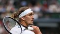 Germany's Alexander Zverev reacts as he plays against US player Taylor Fritz during their men's singles tennis match on the eighth day of the 2024 Wimbledon Championships at The All England Lawn Tennis and Croquet Club in Wimbledon, southwest London, on July 8, 2024. 
HENRY NICHOLLS / AFP