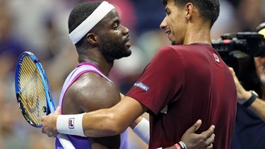 USA's Frances Tiafoe (L) greets Australia's Alexei Popyrin after his victory during their men's singles round of 16 tennis match on day seven of the US Open tennis tournament at the USTA Billie Jean King National Tennis Center in New York City, on September 1, 2024. 
CHARLY TRIBALLEAU / AFP