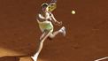 epa12908991 Petra Marcinko of Croatia in action against Belinda Bencic of Switzerland in their women's singles round of 64 game during the Madrid Open tennis tournament at Caja Magica tennis complex in Madrid, Spain, 23 April 2026.  EPA/Chema Moya