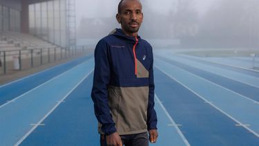 Belgian marathon runner Bashir Abdi poses for a portrait on the KRCG Atletiek track in Gent, on November 30, 2023. The Belgian athlete, qualified for the 2024 Olympic Games in Paris, won bronze medals in the marathon at the 2020 Tokyo Olympics and 2022 World Championships and is the European record holder for marathon. 
SIMON WOHLFAHRT / AFP