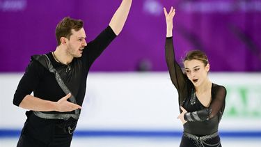 Netherland’s Daria Danilova and Michel Tsiba perform the pairs short program of the ISU European Figure Skating Championships 2024 in the Zalgiris Arena in Kaunas, Lithuania, on January 10, 2024. 
Daniel MIHAILESCU / AFP