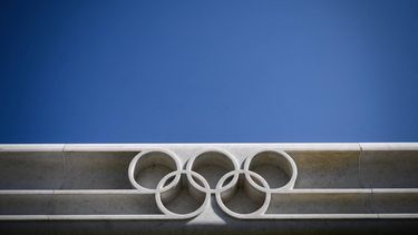 The Olympic Rings logo is pictured in front of the headquarters of the International Olympic Committee (IOC) in Lausanne on March 18, 2020, as doubts increase over whether Tokyo can safely host the summer Games amid the spread of the COVID-19. Olympic chiefs acknowledged on March 18, 2020 there was no 
