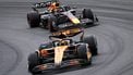 ZANDVOORT - Oscar Piastri (McLaren) (onder), Max Verstappen (Red Bull) (boven) tijdens de F1 Grand Prix van Nederland op het Circuit van Zandvoort. ANP SEM VAN DER WAL