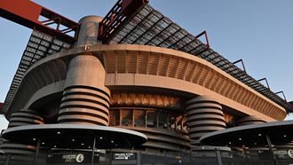 This picture shows the San Siro stadium at the sunset, in Milan, on September 29,2025.  The city of Milan approved on September 30, 2025 the sale of the San Siro stadium to the city's two football giants Inter Milan and AC Milan.
Stefano RELLANDINI / AFP