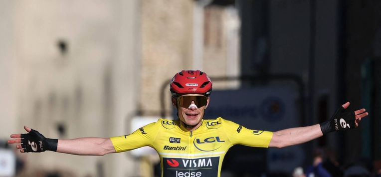 Team Visma - Lease a Bike's Danish rider Jonas Vingegaard celebrates as he crosses crossing the finish to win the 5th stage of the Paris-Nice cycling race, 206.3 km between Cormoranche-sur-Saône and Colombier-le-Vieux, on March 12, 2026. 
Anne-Christine POUJOULAT / AFP