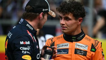 Red Bull Racing's Dutch driver Max Verstappen (L) speaks with McLaren's British driver Lando Norris, who placed third, after winning the United States Formula One Sprint at the Circuit of the Americas in Austin, Texas, on October 19, 2024. 
ANGELA WEISS / AFP