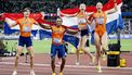 TOKIO - (l-r) Jonas Phijffers, Eugene Omalla, Femke Bol en Lieke Klaver na afloop van de finale van het atletiekonderdeel 4x400 meter gemengde estafette tijdens de WK atletiek in het National Stadium. ANP ROBIN VAN LONKHUIJSEN