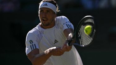Germany's Alexander Zverev returns to US player Marcos Giron during their men's singles third round tennis match on the sixth day of the 2026 Wimbledon Championships at The All England Lawn Tennis and Croquet Club in Wimbledon, southwest London, on July 4, 2026. 
Glyn KIRK / AFP