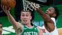 epa09121587 Boston Celtics guard Payton Pritchard (L) takes a shot past defending New York Knicks guard Immanuel Quickley (R) during the second quarter of the NBA basketball game between the New York Knicks and the Boston Celtics at the TD Garden in Boston, Massachusetts, USA, 07 April 2021.  EPA/CJ GUNTHER SHUTTERSTOCK OUT