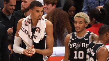 2023-10-30 04:22:54 San Antonio Spurs' French forward-center #01 Victor Wembanyama and San Antonio Spurs' Polish forward 
 Jeremy Sochan walk off the court after the NBA basketball game between the Los Angeles Clippers and the San Antonio Spurs at the Crypto.com Arena in Los Angeles, on October 29, 2023.  
DAVID SWANSON / AFP