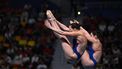 Netherlands' Inge Jansen and Celine Van Duijn compete in the final of the women's 3m springboard synchro diving event during the 2024 World Aquatics Championships at Hamad Aquatics Centre in Doha on February 7, 2024. 
SEBASTIEN BOZON / AFP