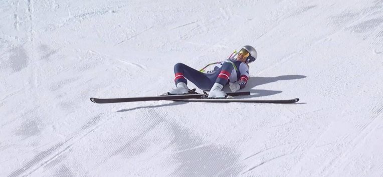 This handout video grab from IOC/OBS shows US Lindsey Vonn crashing during the women's downhill event at the Milano Cortina 2026 Winter Olympic Games in Cortina d’Ampezzo on February 8, 2026. 
Handout / OIS/IOC / OBS / AFP