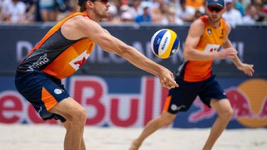 Netherland's Robert Meeuwsen and Netherland's Alexander Brouwer play the ball during the men's semi-finals of the Beach Volleyball Team European Championship match between Netherland and Norway in Vienna, Austria on August 6, 2022. 
GEORG HOCHMUTH / APA / AFP