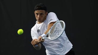 epa11086640 Tallon Griekspoor of the Netherlands in action against Arthur Fils of France during their Men's second round match at the Australian Open tennis tournament in Melbourne, Australia, 18 January 2024.  EPA/MAST IRHAM