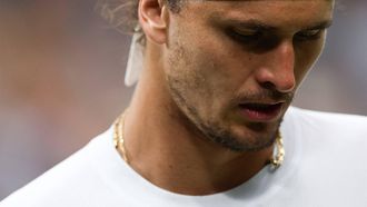 Germany's Alexander Zverev reacts as he plays against US player Taylor Fritz during their men's singles tennis match on the eighth day of the 2024 Wimbledon Championships at The All England Lawn Tennis and Croquet Club in Wimbledon, southwest London, on July 8, 2024. 
HENRY NICHOLLS / AFP