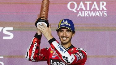 Third-placed Aprilia Racing's Spanish rider Jorge Martin celebrates on the podium at the end of the Qatar MotoGP Grand Prix at the Lusail International Circuit in Lusail, north of Doha, on April 13, 2025. 
Karim JAAFAR / AFP