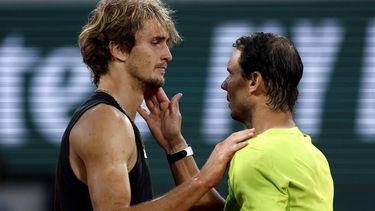 epa09994218 Alexander Zverev of Germany (L) reacts with Rafael Nadal of Spain after retiring due to an injury in the men's semi-final match during the French Open tennis tournament at Roland ​Garros in Paris, France, 03 June 2022.  EPA/YOAN VALAT