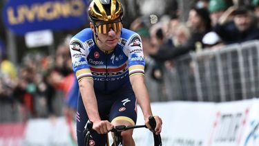 Soudal Quick-Step team's Belgian rider Remco Evenepoel cycles to the finish line to take second place in the 118th edition of the Giro di Lombardia (Tour of Lombardy), a 252km cycling race from Bergamo to Como on October 12, 2024. 
Marco BERTORELLO / AFP