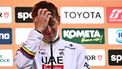 Team UAE's Slovenian rider Tadej Pogacar, third, during the podium ceremony of the Milan - Sanremo one-day classic cycling race, on March 22, 2025. Dutch Mathieu Van Der Poel of team Alpecin-Deceuninck won the race ahead of Team Ineos' Italian rider Filippo Ganna and Team UAE's Slovenian rider Tadej Pogacar, third. 
Marco BERTORELLO / AFP