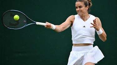 Greece's Maria Sakkari returns against Netherlands' Arantxa Rus during their women's singles second round tennis match on the third day of the 2024 Wimbledon Championships at The All England Lawn Tennis and Croquet Club in Wimbledon, southwest London, on July 3, 2024. 
Ben Stansall / AFP