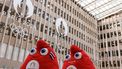A photograph taken in Saint-Denis, north of Paris on March 28, 2024, shows two official Olympic Phryges mascots for the Paris 2024 Summer Olympic and Paralympic Games displayed at headquarters of the Paris 2024 Olympics and Paralympics Organizing Committee (Cojo). 
JOEL SAGET / AFP