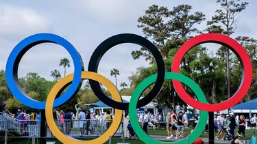 epa11224047 The Olympic Rings logo, promoting the Paris 2024 Summer Olympic Games, are on display in the fan experience area during the third round of The Players Championship golf tournament at TPC Sawgrass in Ponte Vedra Beach, Florida, USA, 16 March 2024.  EPA/ERIK S. LESSER
