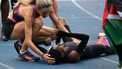 Kenya's Faith Kipyegon (R) reacts at the end of her race after taking part in the 