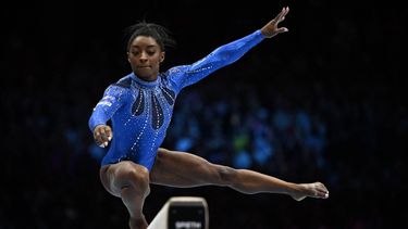 2023-10-06 21:15:01 US' Simone Biles competes on the Balance Beam in the Women's Individual All-Around Final during the 52nd FIG Artistic Gymnastics World Championships, in Antwerp, northern Belgium, on October 6, 2023. 
Lionel BONAVENTURE / AFP