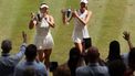 China's Guo Hanyu (L) and France's Kristina Mladenovic poses with their trophies after winning against Brazil's Luisa Stefani and Canada's Gabriela Dabrowski during their women's doubles final tennis match on the fourteenth day of the 2026 Wimbledon Championships at The All England Lawn Tennis and Croquet Club in Wimbledon, southwest London, on July 12, 2026. 
Adrian Dennis / AFP