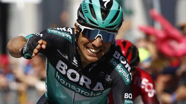 Team Bora rider Italy's Cesare Benedetti reacts as he crosses the finish line to win stage twelve of the 102nd Giro d'Italia - Tour of Italy - cycle race, 158kms from Cuneo to Pinerolo on May 23, 2019. 
Luk BENIES / AFP