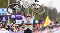 Dutch Mathieu van der Poel of Alpecin-Deceuninck celebrates after winning the men's race of the 'Ronde van Vlaanderen' (Tour des Flandres) one day cycling race, 270,8 km from Antwerp to Oudenaarde, on March 31, 2024. 
LAURIE DIEFFEMBACQ / Belga / AFP