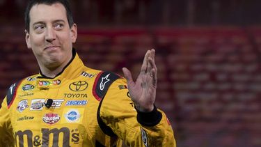 (FILES) 2015 NASCAR Sprint Cup Series Champion Kyle Busch waves as he arrives at the Toyota press conference during the 2017 North American International Auto Show in Detroit, Michigan, on January 9, 2017. NASCAR star Kyle Busch, a two-time Cup series champion regarded as one of the sport's greatest ever drivers, died May 21, 2026 aged 41, his family confirmed in a joint statement. He was in his 22nd season in NASCAR's top division and had been hospitalized earlier Thursday with an undisclosed but 