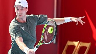 Netherlands' Botic Van De Zandschulp hits a return against China’s Shang Juncheng during their men's singles match at the Hong Kong Open tennis tournament in Hong Kong on January 3, 2024. 
Peter PARKS / AFP