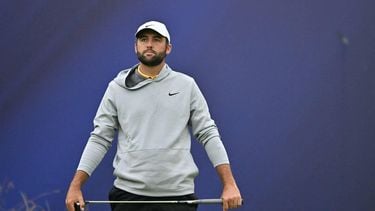 US golfer Scottie Scheffler reacts after missing the course record when his putt failed to drop on the 18th green on day two of the 153rd Open Championship at Royal Portrush golf club in Northern Ireland on July 18, 2025. 
Glyn KIRK / AFP