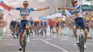 Team DSM-Firmenich PostNL team's French rider Romain Bardet (R) cycles to the finish line ahead of Team DSM-Firmenich PostNL team's Belgian rider Frank Van Den Broek (L) to win the 1st stage of the 111th edition of the Tour de France cycling race, 206 km between Florence and Rimini, in Italy, on June 29, 2024. 
Thomas SAMSON / AFP