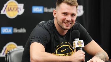 Slovenian professional basketball player Luka Doncic speaks to reporters during the Los Angeles Lakers media day at UCLA Health Training Center El Segundo, California on September 29, 2025. 
Patrick T. Fallon / AFP