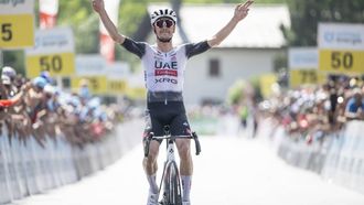 epa12183491 Portuguese rider Joao Almeida of UAE Team Emirates wins the fourth stage of the Tour de Suisse cycling race, over 193.2 km from Heiden to Piuro, Italy, 18 June 2025.  EPA/GIAN EHRENZELLER