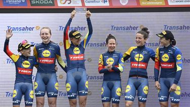US' Lidl-Trek team riders celebrate on the podium after winning the stage 1 of the Vuelta a Espana women's race, a 16 km race against the clock between Valencia and Valencia, on April 28, 2024. 
JOSE JORDAN / AFP