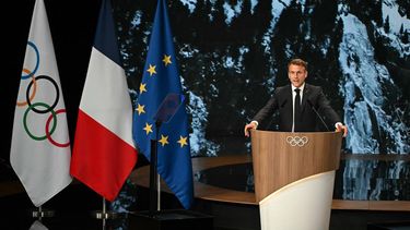 French President Emmanuel Macron speaks during the French Alps' bid for the 2030 Winter Games during the 142nd session of the International Olympic Committee (IOC) in Paris on July 24, 2024, ahead of the Paris 2024 Olympic Games. 
Fabrice COFFRINI / AFP