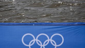 This photograph shows Olympic rings on the venue of the swimming portion of the Paris 2024 Olympic Games triathlon on the banks of the Seine, on July 30, 2024. The Paris Olympics men's triathlon was postponed just hours before it was due to get under way on July 30 after water quality tests on the River Seine revealed it was still too dirty for swimming, organisers said.
Thibaud MORITZ / AFP