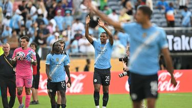 Manchester City's Swiss defender #25 Manuel Akanji (C) greets the fans after winning the FIFA Club World Cup 2025 Group D football match between Italy's Juventus and England's Manchester City at the Camping World stadium in Orlando on June 26, 2025. 
Chandan KHANNA / AFP