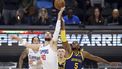 epaselect epa11030336 LA Clippers center Ivica Zubac (L) and Golden State Warriors forward Kevon Looney (R) jump up for the ball during the first quarter of the NBA basketball game between the Golden State Warriors and the Los Angeles Clippers in Los Angeles, California, USA, 14 December 2023.  EPA/CAROLINE BREHMAN SHUTTERSTOCK OUT