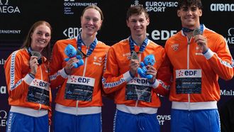 Team Netherlands (LtoR) Netherlands' Marrit Steenbergen, Netherlands' Milou Van Wijk, Netherlands' Merlin Belmon and Netherlands' Sean Niewold pose with their silver medal on the podium of the mixed 4x100m freestyle relay swimming event during the LEN European Aquatics Championships at the Olympic Aquatic Centre in Saint-Denis, northern suburbs of Paris, on August 14, 2026. 
Dimitar DILKOFF / AFP