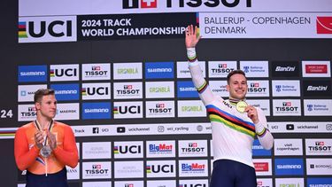 Silver medallist Netherlands' Jeffrey Hoogland (L) and gold medallist Netherlands’ Harrie Lavreysen celebrate on the podium  after the Men's 1 Km Time Trial - Final race of the UCI Track Cycling World Championships in Ballerup, Denmark, on October 18, 2024. 
Jonathan NACKSTRAND / AFP