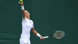 2022-06-28 12:14:59 Netherlands' Arantxa Rus serves to US Catherine Harrison during their women's singles tennis match on the second day of the 2022 Wimbledon Championships at The All England Tennis Club in Wimbledon, southwest London, on June 28, 2022.  
Adrian DENNIS / AFP